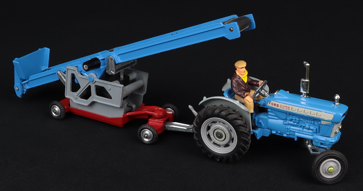 A Corgi Toys No. 72 Ford 5000 Super Major tractor with trenching bucket